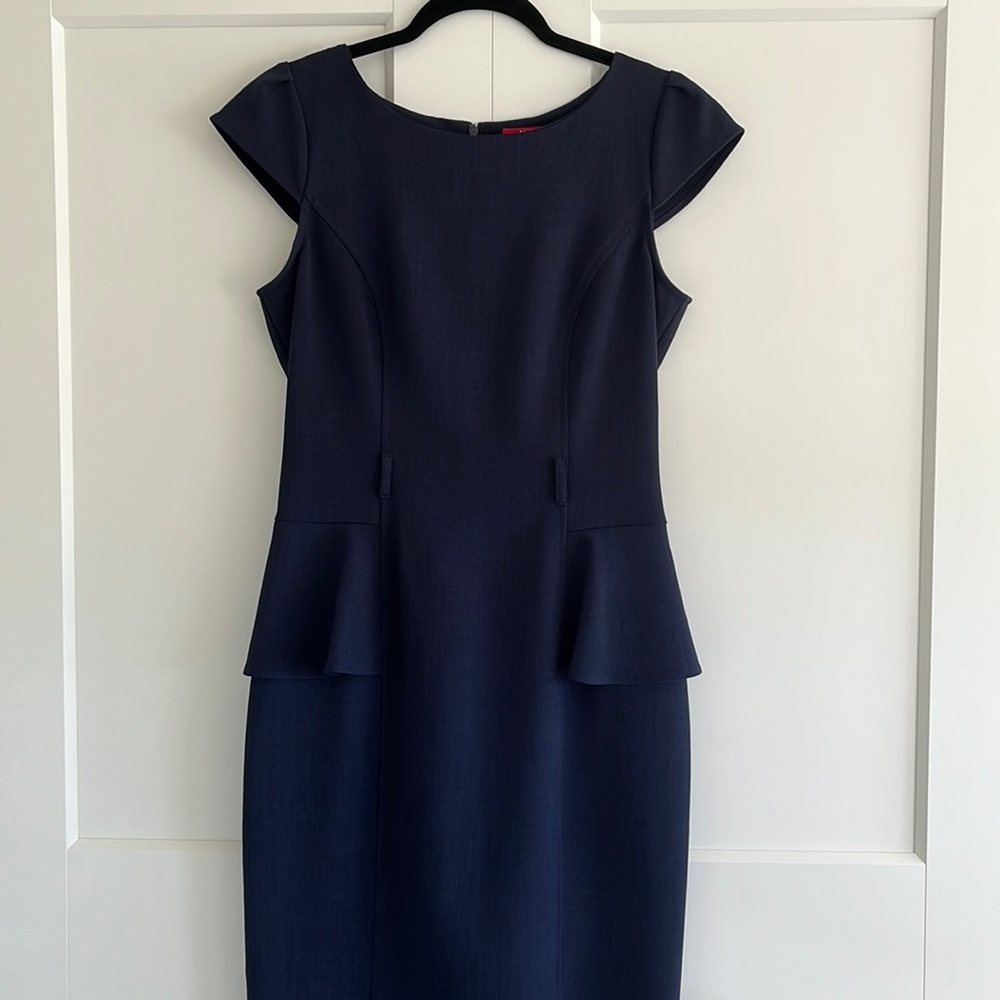 I love this dress, such a feminine look. Reason for selling: I gained weight